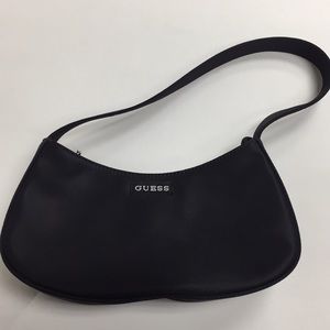 Used Black Guess brand mini handbag